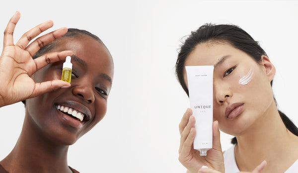 two women holding cbd products