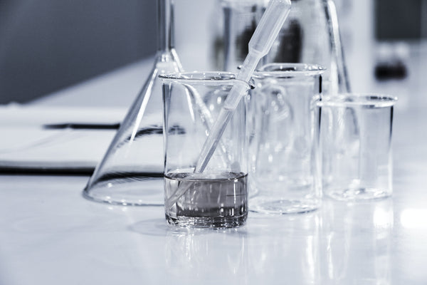 science lab glassware on table