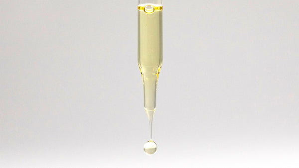cbd oil in glass dropper pipette
